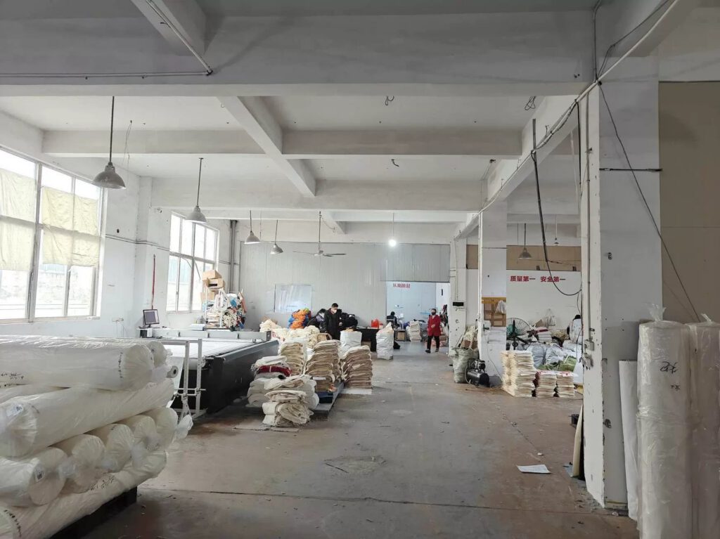 Fabric cutting area with rolls of canvas